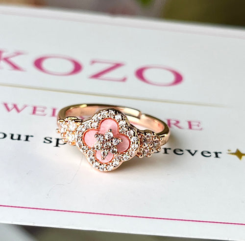 Adjustable pink van cleef ring