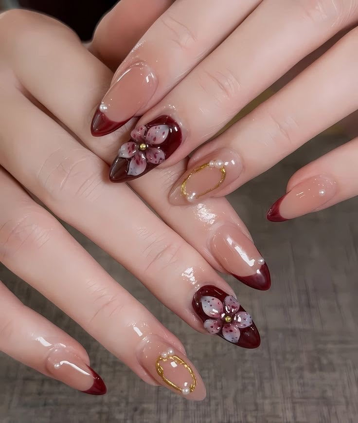 Red nails with golden chrome