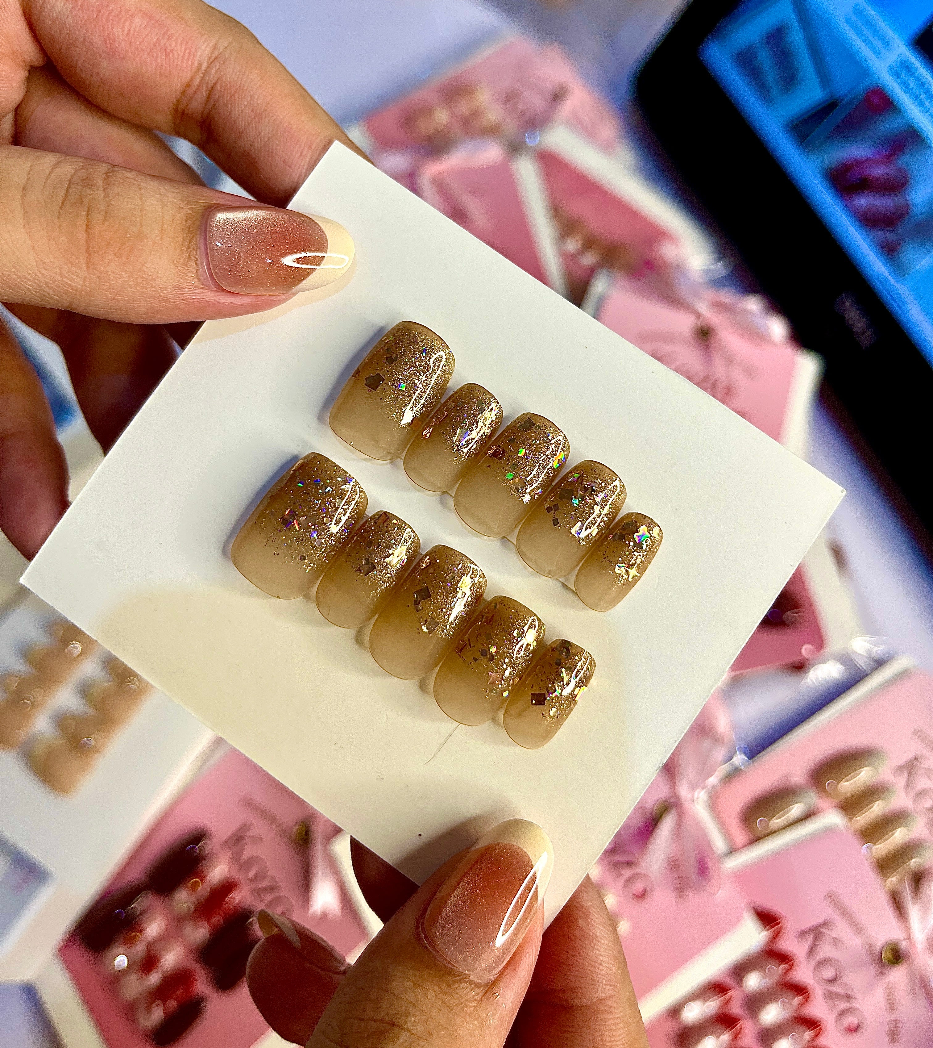Handmade golden glitter nails