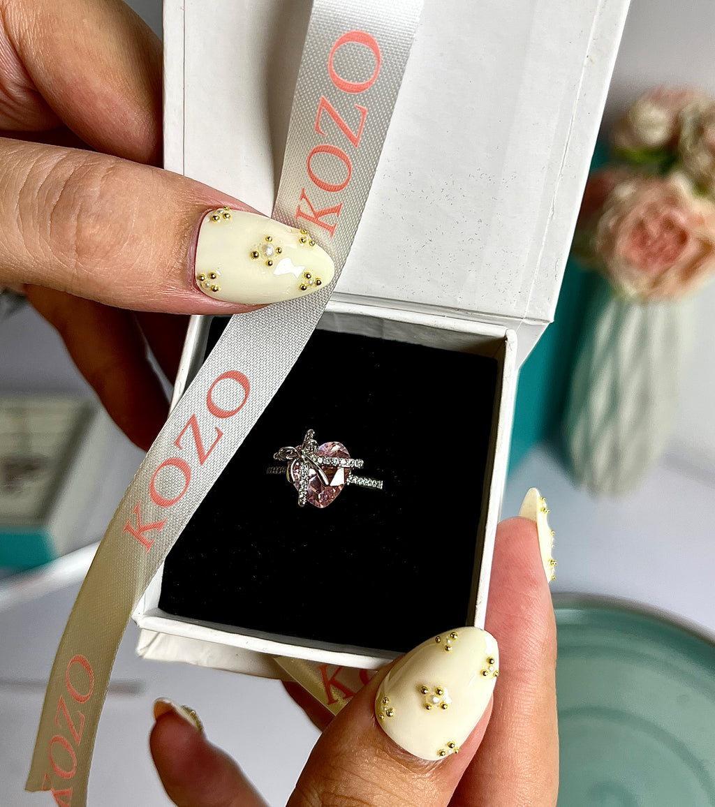Adjustable Pink heart and bow ring