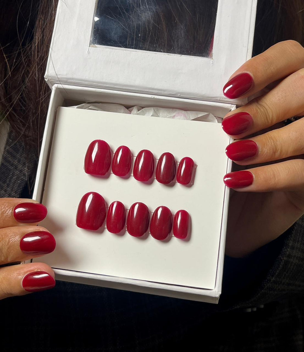 Handmade short oval cherry red nails