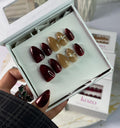 Red and golden cat eye nails