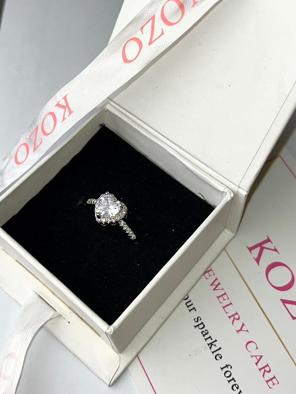 Adjustable silver heart ring